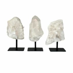clear quartz cluster on stand