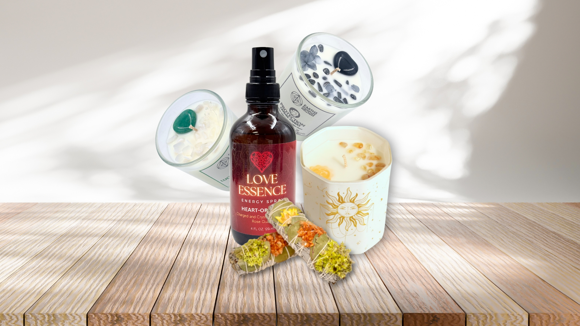 compilation of energy sprays, incense, crystal candles and sage bundles